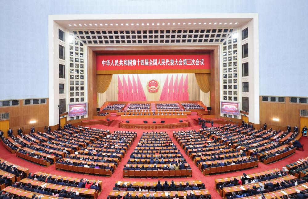 逐梦春天里 同心向未来——十四届全国人大三次会议闭幕侧记(图2)